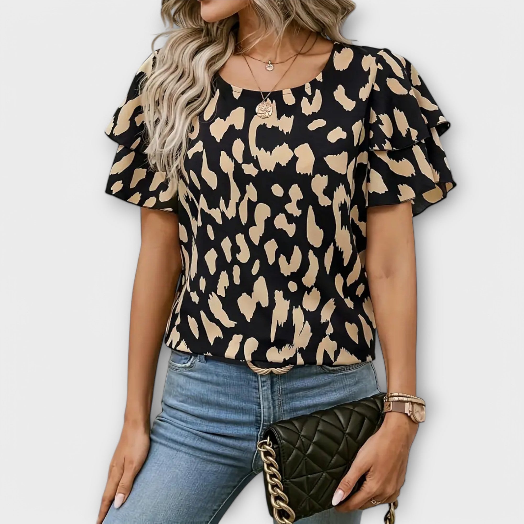 Lela – Stylische Bluse mit Leopardenärmeln