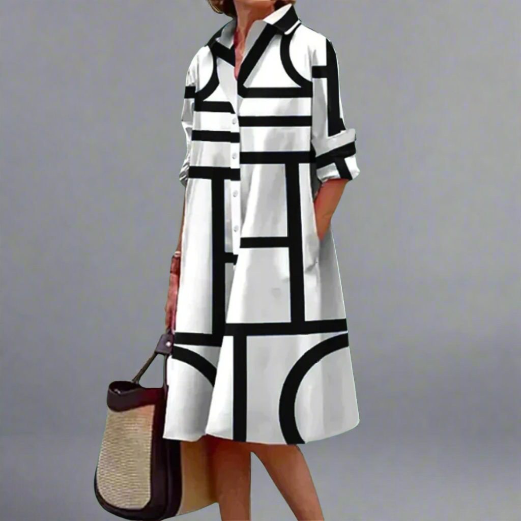 Taylor – Geometrisch Gestreiftes Midi-Kleid mit Modernem Flair