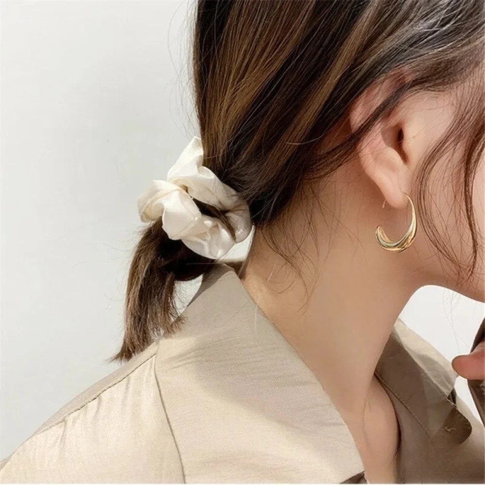 Elegante Ohrringe aus Gold und Silber