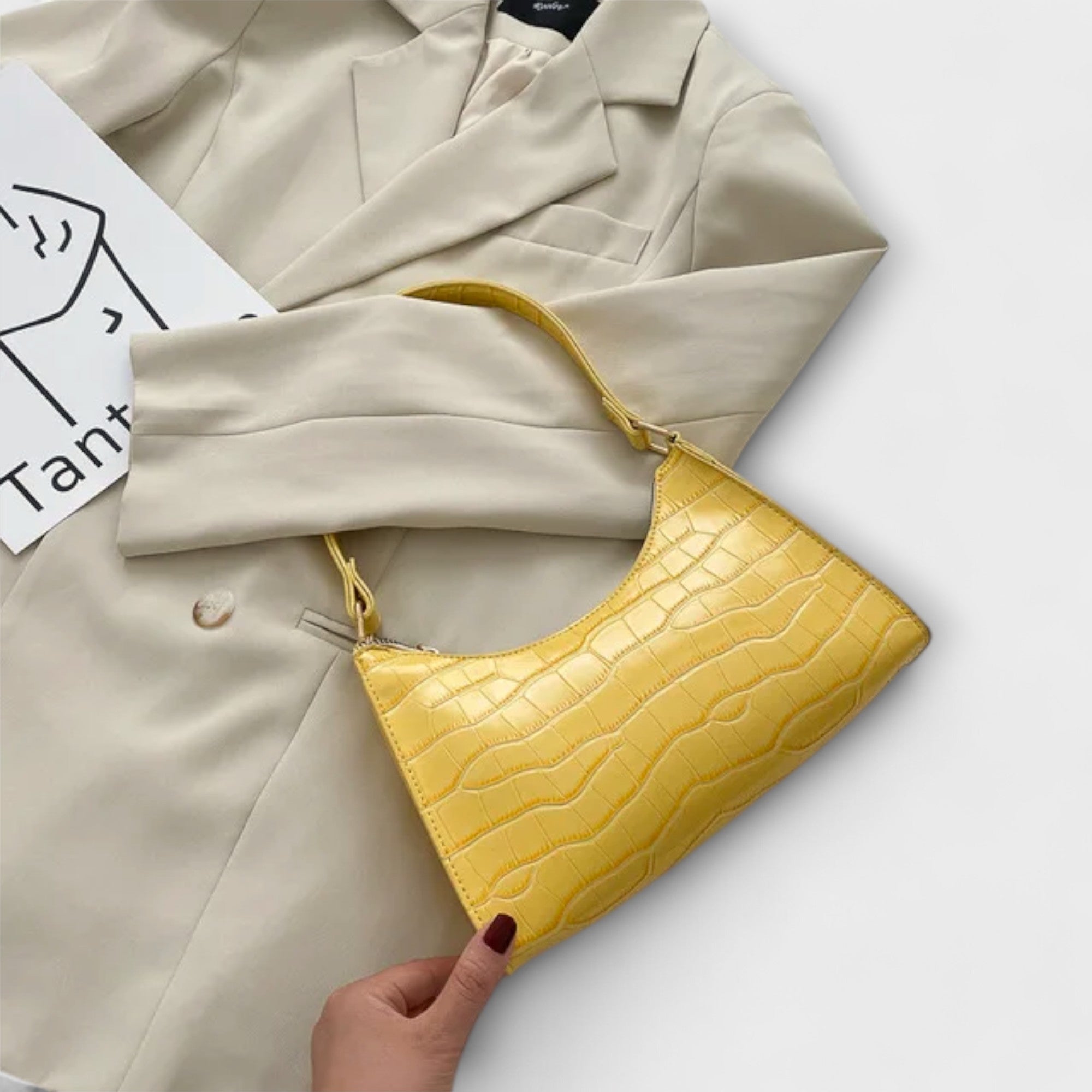 Nora. Glänzende Lederhandtasche
