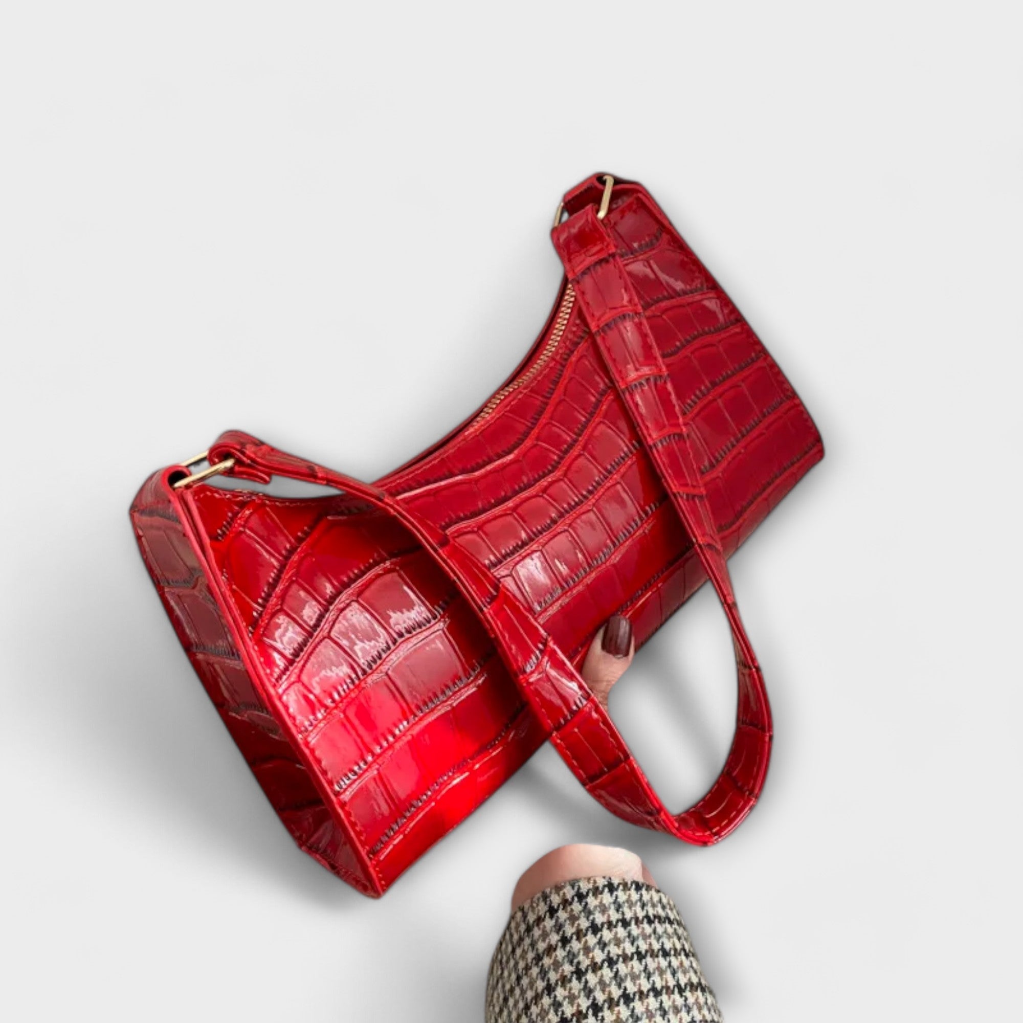 Nora. Glänzende Lederhandtasche