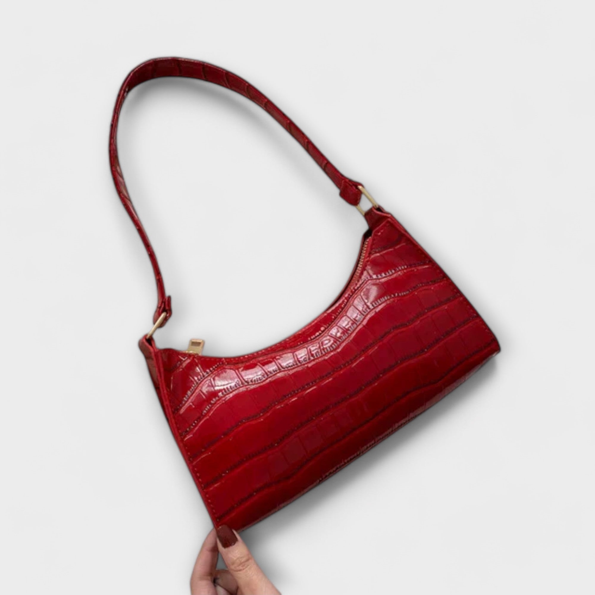 Nora. Glänzende Lederhandtasche