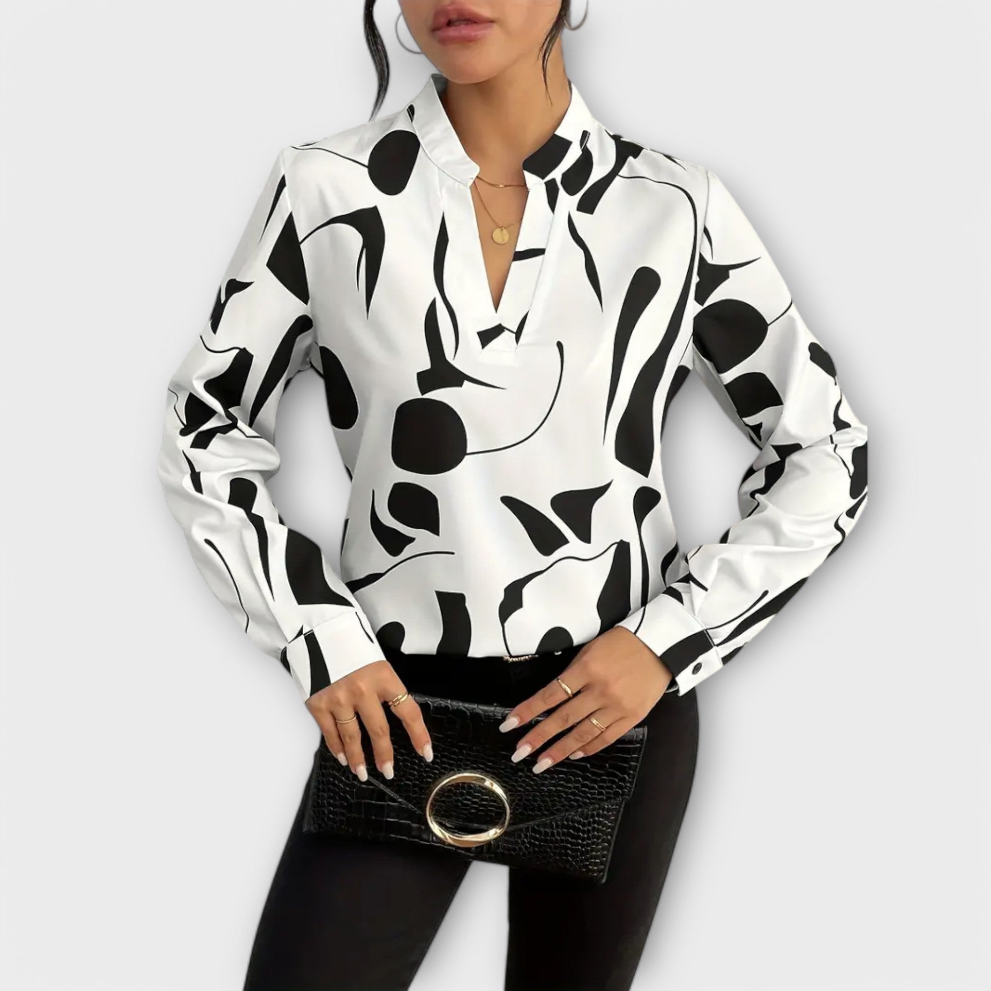 Elegante Bluse mit langen Ärmeln, V-Ausschnitt und geometrischem Muster