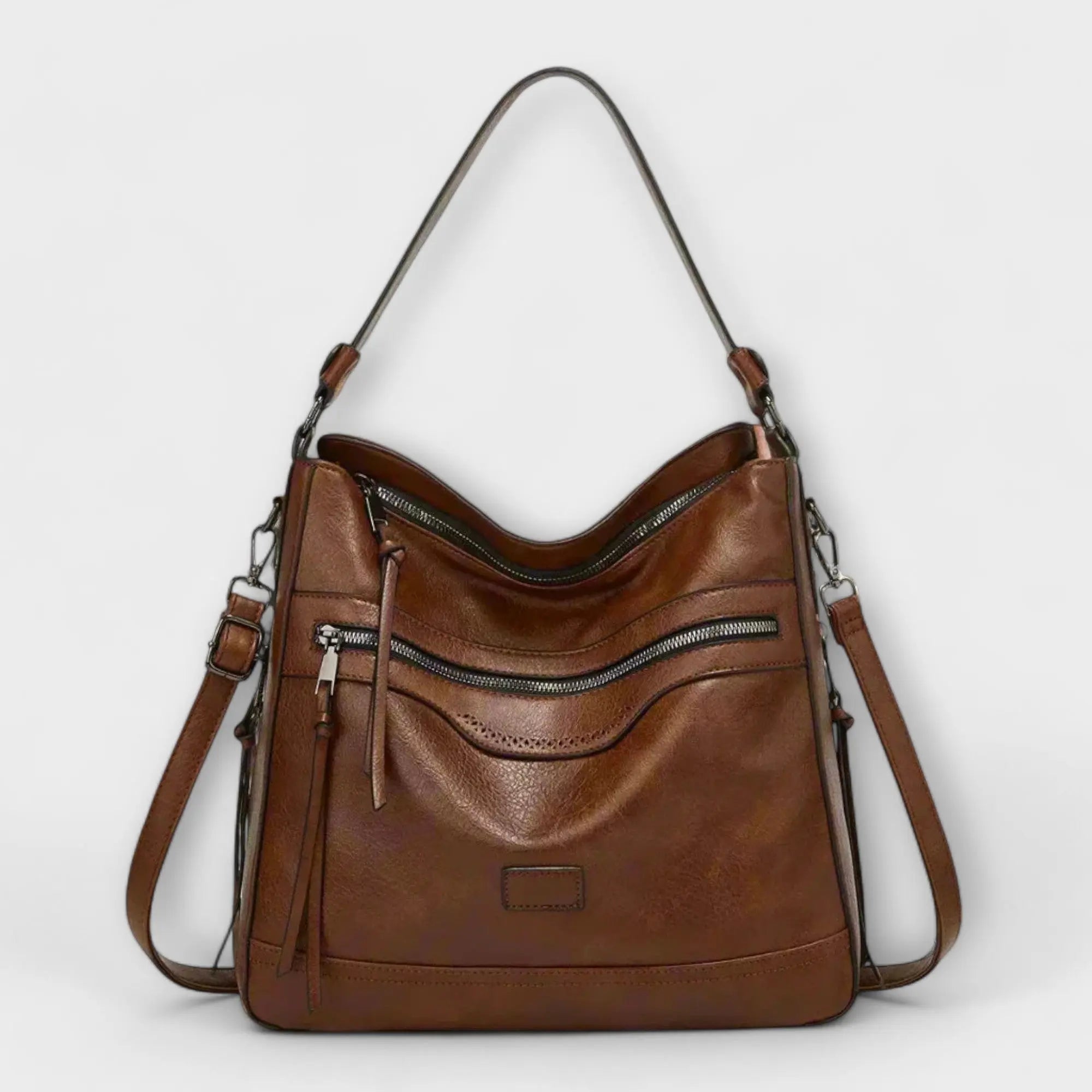Nora. - Klassische Retro Schultertasche Nora Zurich
